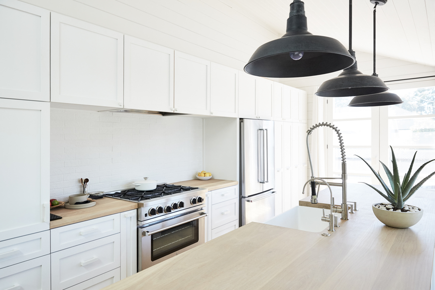 Modern design farmhouse kitchen with stylish matte black lighting