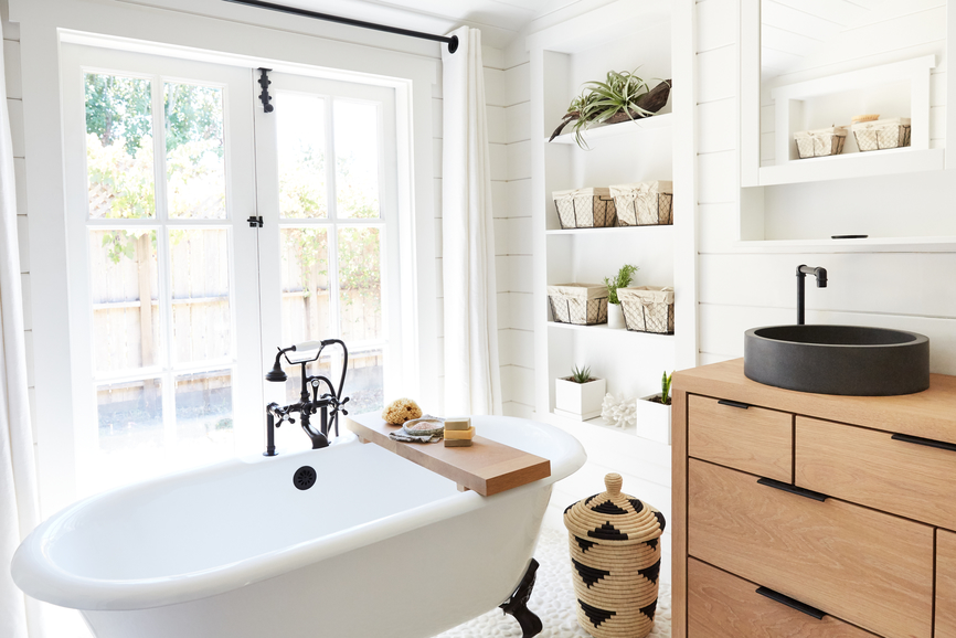 Modern Artisan bathroom with clawfoot tub and white oak vanity